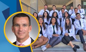 Dr. Charles Vega with a photo of Fall 2021 incoming UCI PRIME-LC students.